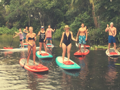 group paddle boarding on florida springs near orlando