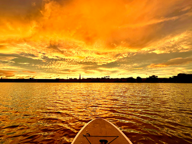 Beautiful sunset overlooking the water on a paddle tour in Orlando
